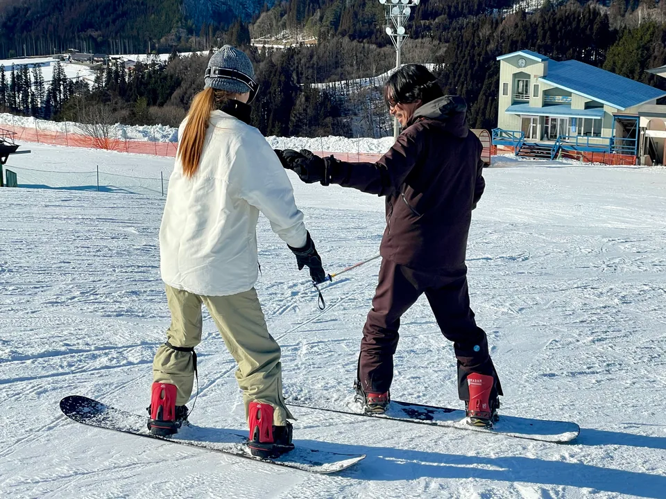 A moment from a snowboard lesson