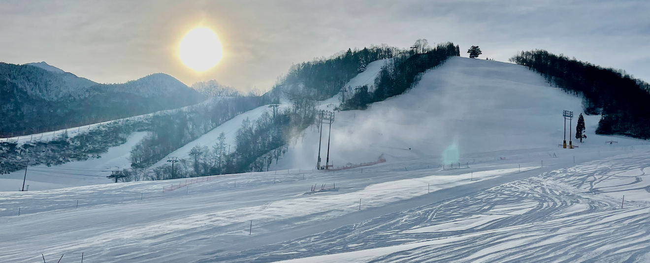 Morning sunlight over the snowy slopes of Honoki